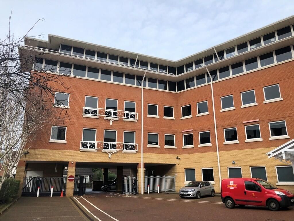 Churchgate, a five-storey red and buff brick building on New Road, Peterborough, before conversion